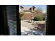 Landscaped backyard with a stone fountain and gravel at 1260 Corista Dr, Henderson, NV 89052