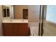 Bathroom with double sinks, tub, and shower at 1260 Corista Dr, Henderson, NV 89052