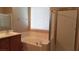 Clean bathroom with bathtub, shower, and wood vanity at 1260 Corista Dr, Henderson, NV 89052