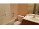 Clean bathroom with shower/tub combo and wood vanity at 1260 Corista Dr, Henderson, NV 89052