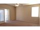 Bright bedroom with sliding glass doors to patio at 1260 Corista Dr, Henderson, NV 89052