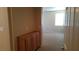 Hallway with built-in wooden cabinets and carpet flooring at 1260 Corista Dr, Henderson, NV 89052