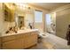 Bathroom with a single vanity, tub, and shower at 1429 Daybreak Dr, Las Vegas, NV 89108