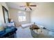 Small bedroom with window, ceiling fan, and carpeted floor at 1429 Daybreak Dr, Las Vegas, NV 89108