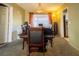 Formal dining room with a wooden table and six chairs at 1429 Daybreak Dr, Las Vegas, NV 89108