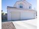 Two-story house with a two-car garage and gravel landscaping at 1429 Daybreak Dr, Las Vegas, NV 89108