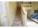 Beige carpeted staircase leading to the upper floor at 1429 Daybreak Dr, Las Vegas, NV 89108