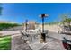 Relaxing backyard patio with seating and heater at 1510 Marita Dr, Boulder City, NV 89005