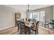 Charming dining room featuring a wood table and hardwood floors at 1510 Marita Dr, Boulder City, NV 89005