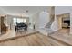 Elegant dining room with hardwood floors and a view to the staircase at 1510 Marita Dr, Boulder City, NV 89005