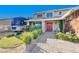 Front entry with red door and landscaping at 1510 Marita Dr, Boulder City, NV 89005