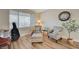 Bright sitting room featuring hardwood floors and comfortable armchairs at 1510 Marita Dr, Boulder City, NV 89005