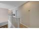 Upper hallway with white railings and storage at 1510 Marita Dr, Boulder City, NV 89005