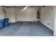 Attached garage with epoxy coated floor at 1529 Tillman Falls Ave, Las Vegas, NV 89183