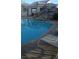 Relaxing community pool with rock waterfall feature at 1529 Tillman Falls Ave, Las Vegas, NV 89183