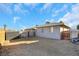 Backyard view of house, shed, and gravel area at 1641 Stewart Ave, Las Vegas, NV 89101