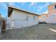 Side yard with shed and wooden fence at 1641 Stewart Ave, Las Vegas, NV 89101