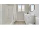 Clean bathroom with a bathtub, shower, vanity, and updated fixtures at 1641 Stewart Ave, Las Vegas, NV 89101