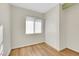 Simple bedroom with wood-look flooring and a large closet at 1641 Stewart Ave, Las Vegas, NV 89101