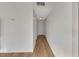 Long hallway with light walls and wood-look floors at 1641 Stewart Ave, Las Vegas, NV 89101