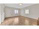 Living room with wood-look floors and window at 1641 Stewart Ave, Las Vegas, NV 89101