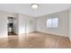 Bright living room with wood-look floors and kitchen view at 1641 Stewart Ave, Las Vegas, NV 89101