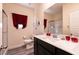 Clean bathroom with single sink vanity, shower, and toilet at 1642 Dire Wolf Ave, North Las Vegas, NV 89084