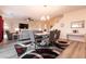 Dining area with seating for six, open to the living room and kitchen at 1642 Dire Wolf Ave, North Las Vegas, NV 89084