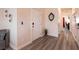 Bright entryway with wood-look floors and an open floor plan at 1642 Dire Wolf Ave, North Las Vegas, NV 89084