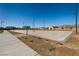 Outdoor sand volleyball court with surrounding homes visible at 1642 Dire Wolf Ave, North Las Vegas, NV 89084