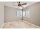 Bedroom with ceiling fan and tile floors at 1901 Summit Pointe Dr, Las Vegas, NV 89117