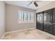 Bedroom with double door closet and tile floors at 1901 Summit Pointe Dr, Las Vegas, NV 89117