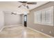 Spacious bonus room with ceiling fan and tile floors at 1901 Summit Pointe Dr, Las Vegas, NV 89117