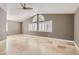 Main bedroom with high ceilings and arched window at 1901 Summit Pointe Dr, Las Vegas, NV 89117