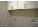 Laundry room with upper cabinets and hookups at 1908 Quail Point Ct, Las Vegas, NV 89117