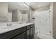 Main bathroom with double sinks and a shower at 1937 Shanon Michelle Ave, North Las Vegas, NV 89031