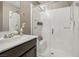 Clean bathroom with a walk-in shower and modern vanity at 1937 Shanon Michelle Ave, North Las Vegas, NV 89031