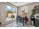 Small breakfast nook with sliding door leading to backyard patio at 1937 Shanon Michelle Ave, North Las Vegas, NV 89031