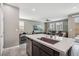 Kitchen island with sink overlooking living room at 1937 Shanon Michelle Ave, North Las Vegas, NV 89031