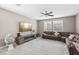 Open living area featuring a sectional sofa and a built-in electric fireplace at 1937 Shanon Michelle Ave, North Las Vegas, NV 89031