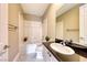 Clean bathroom with a bathtub, shower, and granite vanity at 2 Cerchio Centrale, Henderson, NV 89011