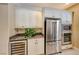 Kitchen features stainless steel appliances and wine cooler at 2 Cerchio Centrale, Henderson, NV 89011