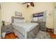 Primary bedroom with hardwood floors and ceiling fan at 2050 N Los Feliz St # 172, Las Vegas, NV 89156