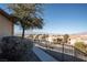 Complex exterior view showcasing landscaping and mountain views at 2050 N Los Feliz St # 172, Las Vegas, NV 89156