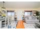 Bright living room features hardwood floors and neutral colored furniture at 2050 N Los Feliz St # 172, Las Vegas, NV 89156