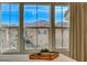 Bedroom with window showcasing a scenic mountain view and neighborhood at 2077 Via Firenze, Henderson, NV 89044