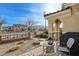 Small front patio with seating and grill, overlooking a quiet street at 2077 Via Firenze, Henderson, NV 89044