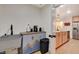 Well-equipped kitchenette featuring a farmhouse sink and coffee bar at 2077 Via Firenze, Henderson, NV 89044