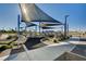 Community playground with shade structures and play equipment at 2077 Via Firenze, Henderson, NV 89044