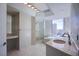 Modern bathroom with double vanity, soaking tub, and shower at 222 Karen Ave # 2308, Las Vegas, NV 89109